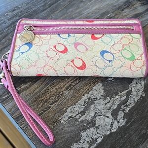 Coach Multicolor Signature C Wristlet with Pink Trim and Silver Charm. 8.25x4.25